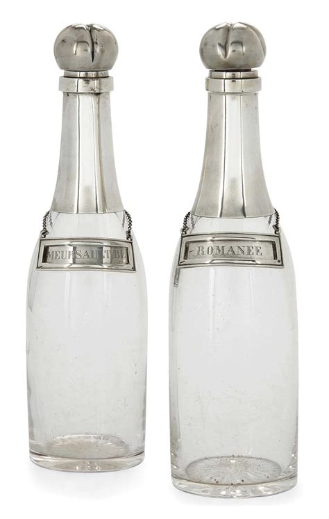 A Pair Of Victorian Novelty Silver Mounted Glass Decanters In The Form