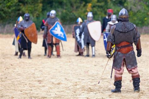 Archer Facing A Group Of Knights Ready For Battle Editorial Stock Image