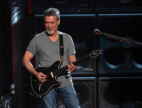 Rock Legend Eddie Van Halen Dies At Age 65 Following Battle With Cancer