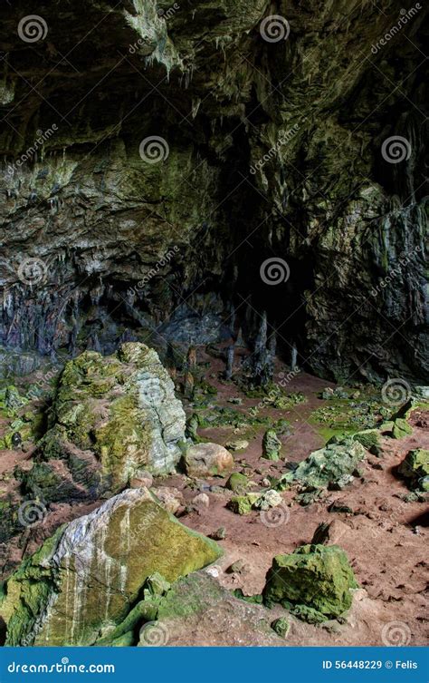 Nimara Cave With Moss Covered Rocks And Red Soil Stock Image Image Of