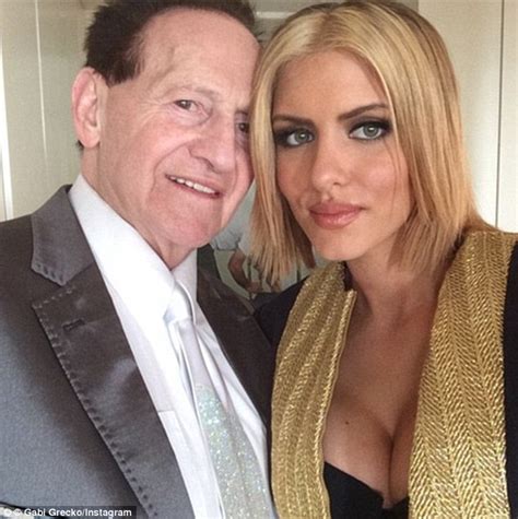 Gabi Grecko Flirts With Bare Chested Model While Geoffrey Edelsten Is