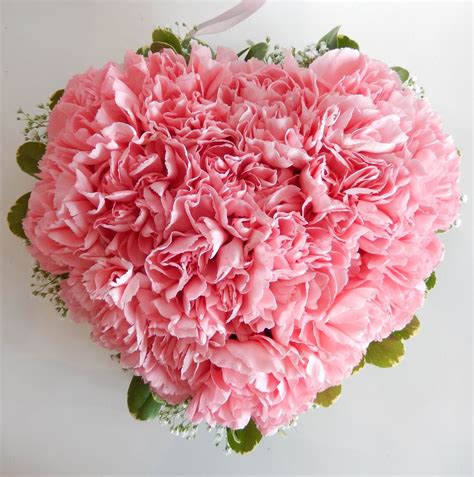 Beautiful Heart Of Carnations Available In Pink And Red That Extra
