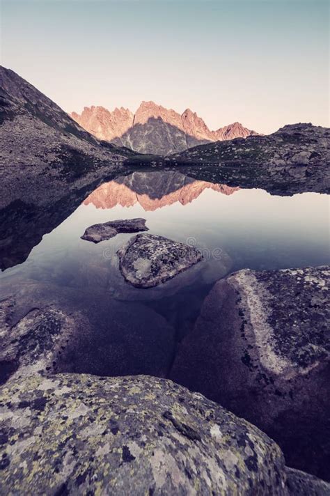 Mountain Peaks Reflected In Water Stock Photo Image Of Outdoor Lake