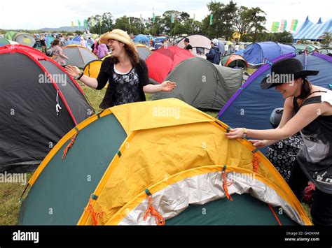 Campers Work On Their Tents At The T In The Park Music Festival Campsite At Balado After The