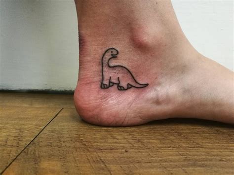 Dinosaur Lovers Will Geek Out Over These 27 Awesome Tattoo Ideas Dinosaur Tattoos Tattoos