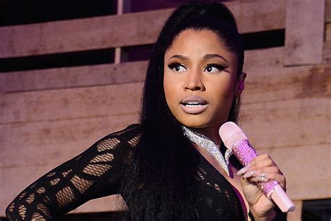 Nicki Minaj Squeezes Fans Boobs Onstage In Germany Photo