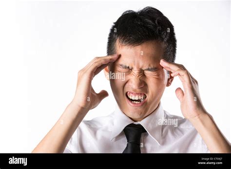 Man Holding His Head In Distress Stock Photo Alamy