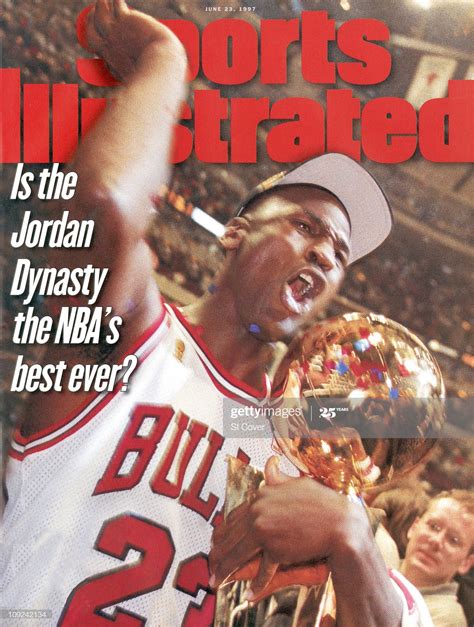 The Cover Of Sports Illustrated Magazine With Michael Jordan Holding Up