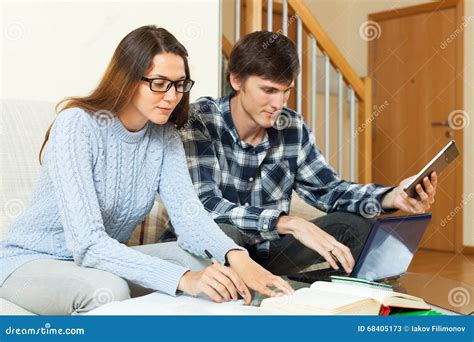 Serious Student Couple Preparing For Session Together Stock Image
