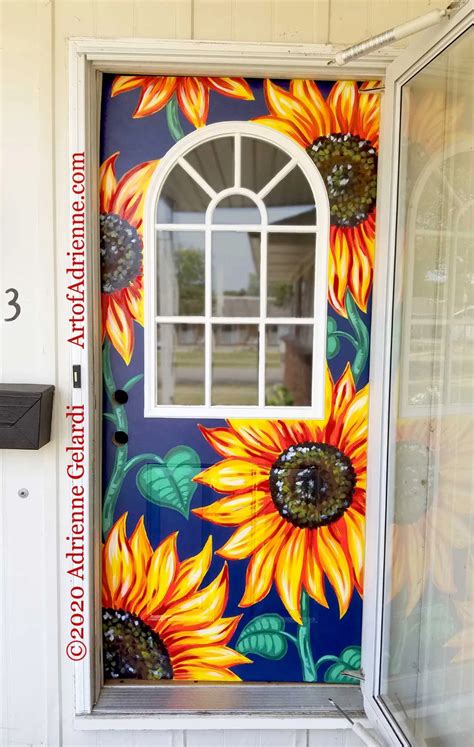 An Open Door With Sunflowers Painted On It