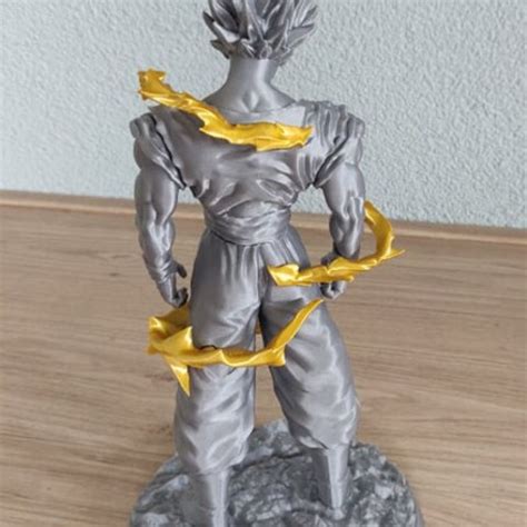 This model is a basic male with a bald head, he doesn't appear to be wearing any clothes. Download 3D printer model Goku Dragon ball z 3d print ・ Cults