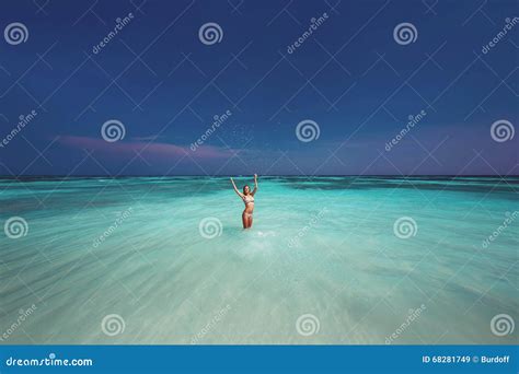 Beautiful Woman In Bikini Splashing Water In Sea Stock Image Image Of People Sand 68281749