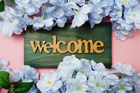 Welcome Back Sign With Flowers