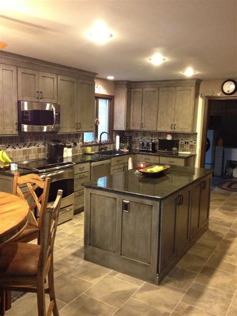 As a sample of contrast color selection, this kitchen is a good example with cabinets all the way to the ceiling which has uba tuba granite tops. Rainforest Star: Uba Tuba Granite Countertop