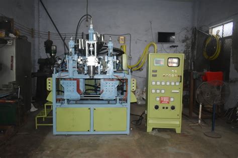 1 liter double station blow moulding machine at best price in delhi dyzen machinery and plastic