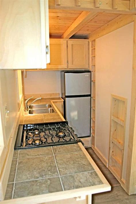 Check out these very well tiny house kitchen ideas. Tiny House with a Flip Up Porch