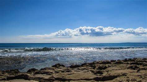 Images Gratuites plage mer côte le sable Roche océan horizon nuage ciel lumière du