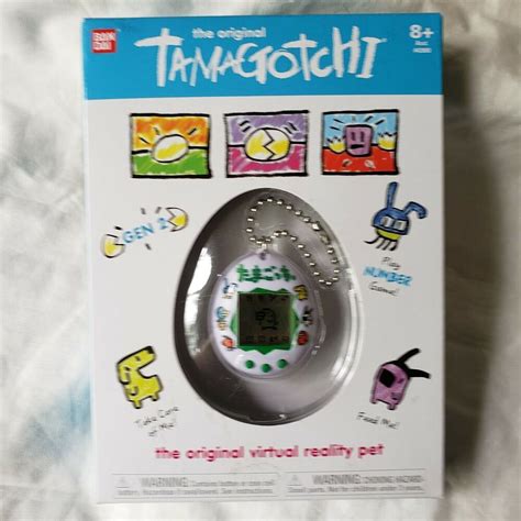 Tamagotchi Original Virtual Reality Electronic Pet Game Japanese Logo