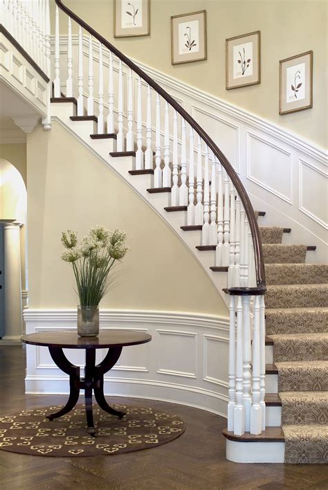 A Curved Interior Staircase Adds Grace And Elegance Colonial Staircase
