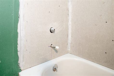 I tiled the walls with blue ceramic tiles mainly with a few white and yellow tiles mixed in. How to Finish the Joint Between a Tile Backer and Drywall ...
