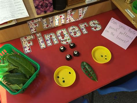 Hole Punching Leaves On The Funky Fingers Table Pre Writing Writing Skills Finger Gym Funky