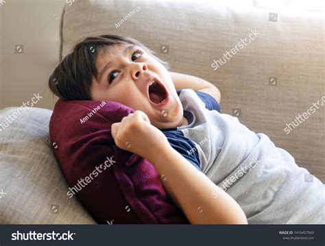 Close Face Kid Yawning Lying On Stock Photo 1416457943 Shutterstock