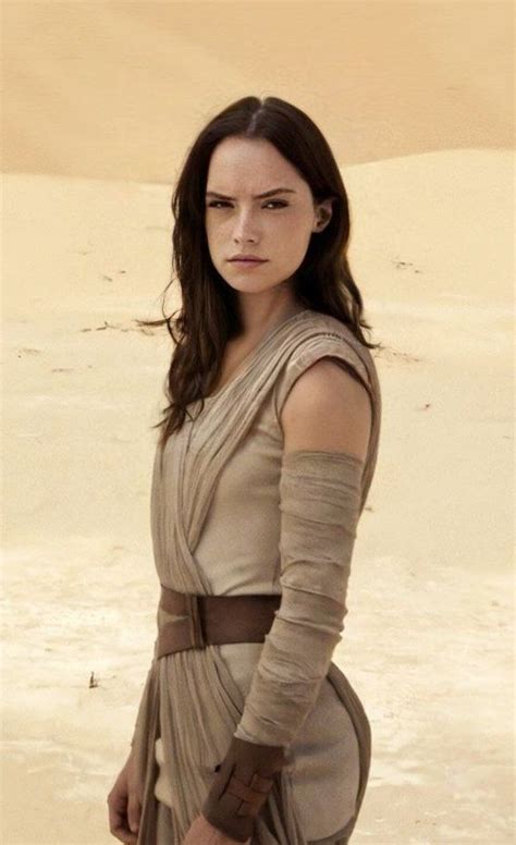 A Woman Standing In The Desert Wearing A Star Wars Outfit