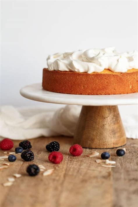 Lemon Coconut Cake With Cream And Berries VIDEO A Beautiful Plate