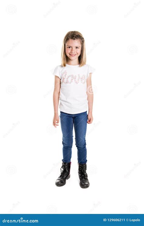 Portrait Of A Cute 7 Years Old Girl Isolated Over White Background