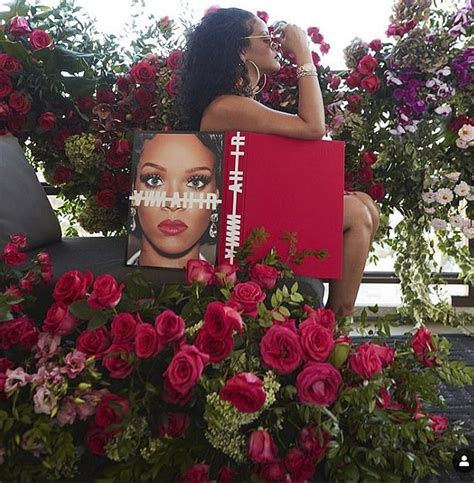 Rihanna Poses In Floral Sanctuary As She Uses Her Highly Anticipated