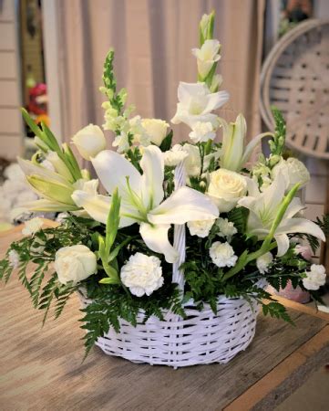 This facility is a funeral home funeral director: White Remembrance Basket Funeral Flowers in Murphy, NC ...