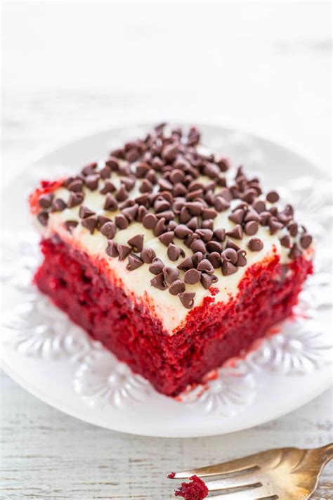 One bite, and you will save your cream cheese frosting for carrot cake! Red Velvet Poke Cake with Cream Cheese Frosting - Averie Cooks