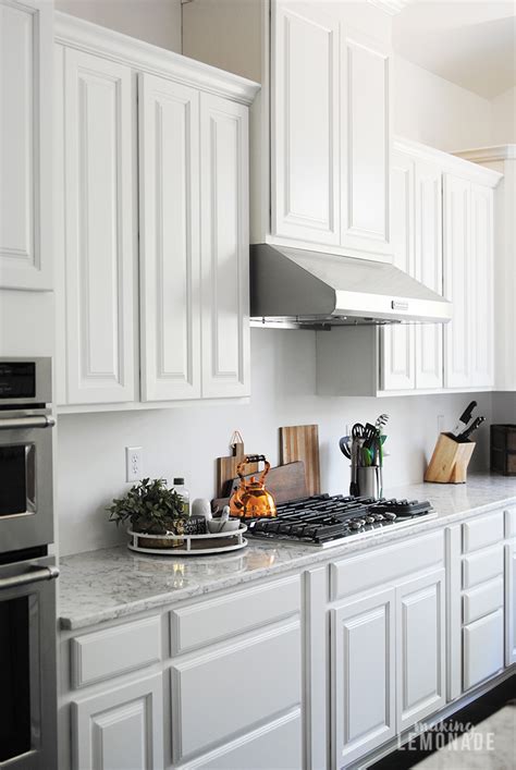 Hampton bay hampton satin white raised panel stock assembled wall kitchen cabinet (12 in. An Easy Kitchen Update that Makes a Huge Difference ...