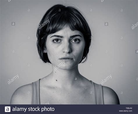 Black And White Portrait Of Young Sad Woman Serious And Concerned