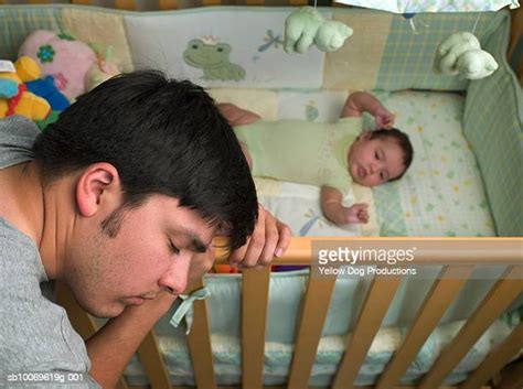 Hispanic Baby Sleeping In Crib Photos And Premium High Res Pictures