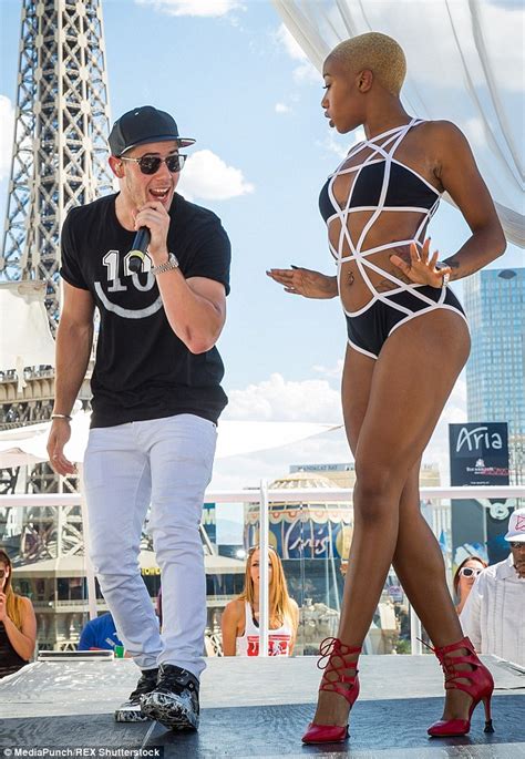 Nick Jonas Parties And Puffs On Cigars In Las Vegas After Olivia Culpo