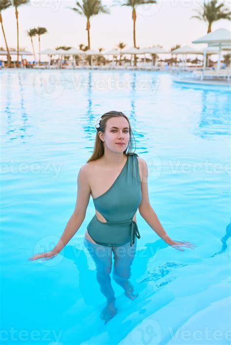 Beautiful Woman Chilling Out By The Swimming Pool Summer Recreation