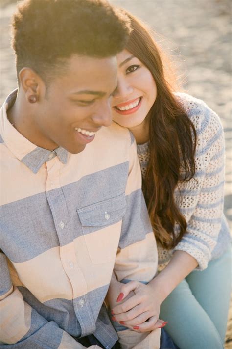 urban outfitters style engagement session pink cream blue and denim mixed race couple