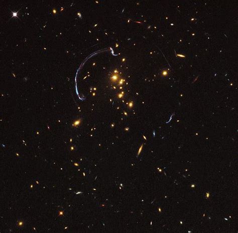 Gravitational Lens In Galaxy Cluster Rcs2 032727 132623 Brightest