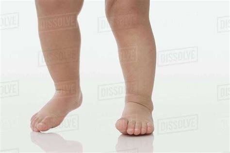 Legs Of A Baby Stock Photo Dissolve