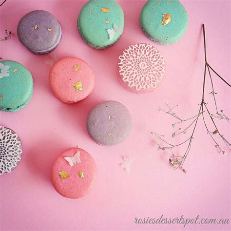 Pastel Coloured Gold Leaf Macarons Filled With White Chocolate Ganache And Topped With Edible
