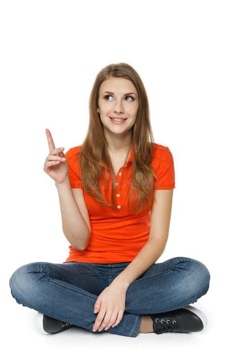 Female Sitting On The Floor Pointing Up Stock Image Image Of
