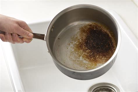 How to clean a burnt stainless steel pot. 5 Ways to Clean a Scorched Pan | Kitchn