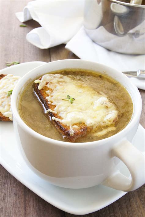 Toss the cheeses together and sprinkle over the bread. CLASSIC FRENCH ONION SOUP WITH CHEESY CROUTES | GARLIC MATTERS