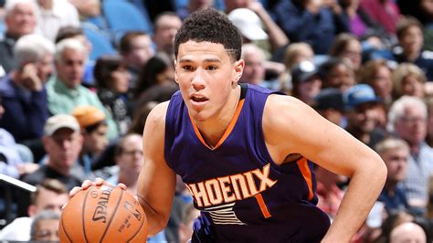 Devin booker is a professional american basketball player who plays for the 'national basketball association' (nba) team 'phoenix suns.' he was born to famous basketball player melvin booker. SLAM Top 50: Devin Booker, No. 47 | SLAMonline