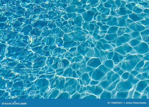 Blue Water In Swimming Pool Background Ripple Water In Swimming Pool With Sun Reflection Stock