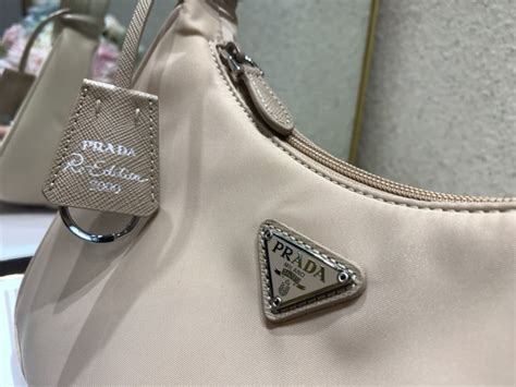 Prada shoulder bag in nylon with canvas and leather trim. Prada Hobo Re-Edition 2000 Nylon Vintage Bag Beige [prada ...