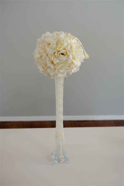 Some of the technologies we use are necessary for critical functions like security and site integrity, account authentication, security and privacy preferences, internal site usage and maintenance data, and to make the site work correctly for browsing and transactions. DIY Eiffel tower centerpiece with flower ball. Wrapped in lace, filled with pearls and topped ...