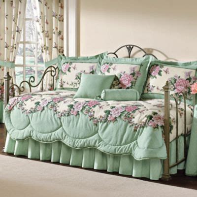 A daybed bedding set will often consist of a bedspread/comforter, bed skirt, and shams. daybed bedding