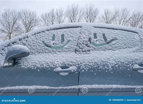 Smiley Car In The Snow In A Street Along Trees Stock Image Image Of